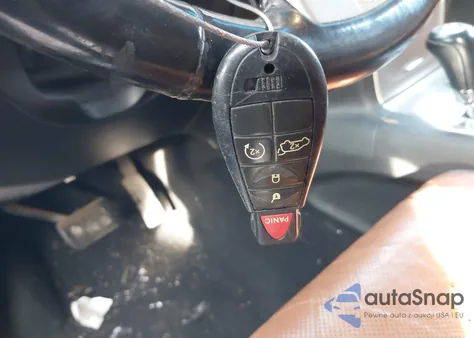 2012 Jeep Grand Cherokee Overland из США, поврежденный, VIN 1C4RJFCTXCC179034